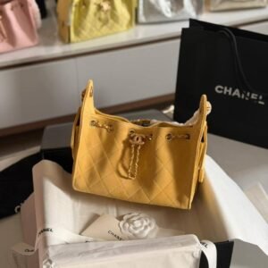 Shop Chanel 25 Mini Quilted Suede Ginger Yellow Hobo Bag